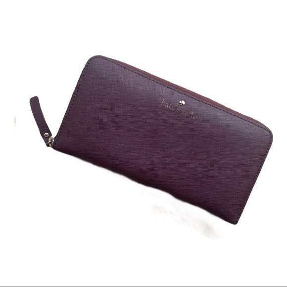 kate spade Handbags - Kate spade plum leather wallet